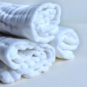 A bunch of Organic Burp Cloths kept together with white background